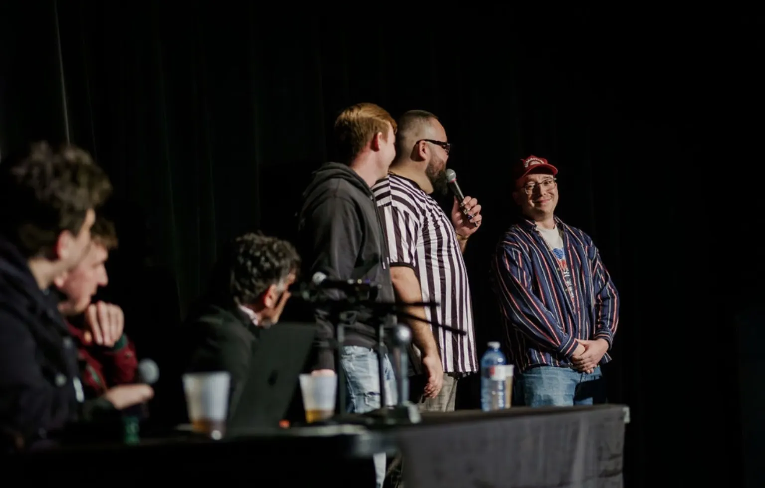 Comedians interacting on stage